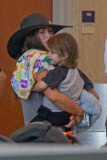 Megan Fox and Brian Austin Green with their children at LAX