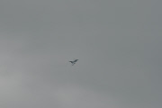 Military jet escorts passenger plane into Manchester Airport, Britain - 05 Aug 2014