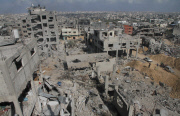Gaza residents return to their district in ruins