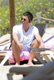 EXC - NOEL GALLAGHER AND WIFE SARA MACDONALD AT THE BEACH IN SPAIN