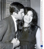 A Kiss For Actress Miss Rosanna Schiaffino From Actor George Hamilton Who Arrived Today To Make 'the Victors' At Shepperton Studios In Which They Both Star. Pkt 1737 - 124843 Original Print Held In Kensington.