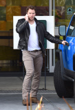 Hunky actor Chris Pratt looks preoccupied while on his cell phone