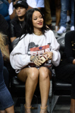 Rihanna sits courtside as Chris Brown plays in the Summer Classic Charity Game!