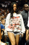Rihanna sits courtside as Chris Brown plays in the Summer Classic Charity Game!