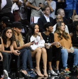 Rihanna sits courtside as Chris Brown plays in the Summer Classic Charity Game!