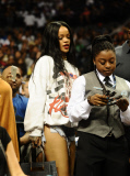 Rihanna sits courtside as Chris Brown plays in the Summer Classic Charity Game!