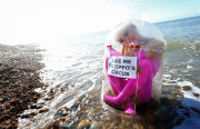 Girl in a bottle washes up on Brighton beach, Britain - 21 Aug 2014
