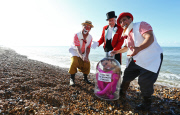 Girl in a bottle washes up on Brighton beach, Britain - 21 Aug 2014