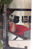 Topher Grace hits the weights at the gym