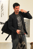 *EXCLUSIVE* Actor Keanu Reeves gets his own bags then outs lady friend on bus at LAX