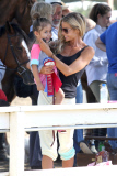 Denise Richards supports her equestrian daughter Lola on the sidelines