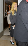 Elle Fanning gives an 'ello at LAX