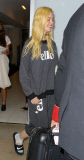 Elle Fanning gives an 'ello at LAX