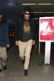 Robert Pattinson makes a low-key arrival at LAX