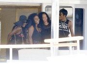 RIHANNA HAVING HER PICTURE TAKEN WITH THE CREW