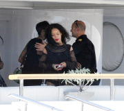 RIHANNA HAVING HER PICTURE TAKEN WITH THE CREW