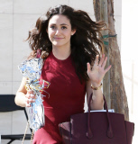 Emmy Rossum looking radiant in red