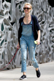 Naomi Watts rocks overalls while taking her pooch for a walk