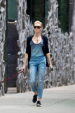 Naomi Watts rocks overalls while taking her pooch for a walk