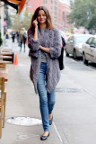 Brazilian supermodel Barbara Fialho takes an important call in Soho
