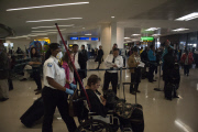 Ebola screening ramped up at NYC area airports