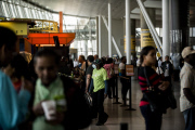 Ebola screening ramped up at NYC area airports