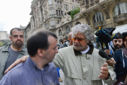Five Stars Movement Leader Beppe Grillo is challenged during his visit to the flooded areas in Genoa, Italy - 14 Oct 2014