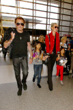 French singer Johnny Hallyday departs LAX with his whole family