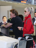 French singer Johnny Hallyday departs LAX with his whole family