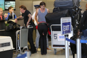 French singer Johnny Hallyday departs LAX with his whole family
