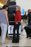 French singer Johnny Hallyday departs LAX with his whole family