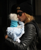 Paris Hilton makes out with her pup