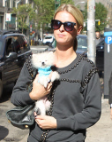 Paris Hilton makes out with her pup