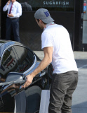 PREMIUM EXCLUSIVE New dad Ashton Kutcher wearing a W on his hat and Kabbalah scarf