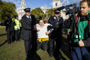 Police make arrests at Occupy London demonstration in Parliament Square, London, Britain - 21 Oct 2014