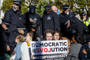 Police make arrests at Occupy London demonstration in Parliament Square, London, Britain - 21 Oct 2014
