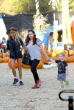 Paulina Rubio is a sexy cowgirl at Mr Bones Pumpkin Patch