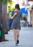 Selma Blair shows off her legs in a short summer dress while window shopping