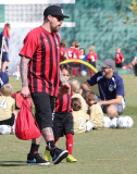 PREMIUM EXCLUSIVE Joel Madden helps coach Sparrow's soccer game