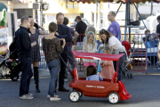Buddies Ian Ziering and Jon Cryer enjoy a family moment at the Farmer's Market