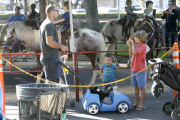 Buddies Ian Ziering and Jon Cryer enjoy a family moment at the Farmer's Market