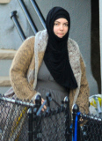 Exclusive... Boston Marathon Bombing Suspect's Widow Katherine Russell Steps Out With Her Daughter 