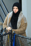 Exclusive... Boston Marathon Bombing Suspect's Widow Katherine Russell Steps Out With Her Daughter 