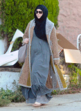 Exclusive... Boston Marathon Bombing Suspect's Widow Katherine Russell Steps Out With Her Daughter 