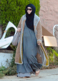 Exclusive... Boston Marathon Bombing Suspect's Widow Katherine Russell Steps Out With Her Daughter 