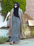 Exclusive... Boston Marathon Bombing Suspect's Widow Katherine Russell Steps Out With Her Daughter 
