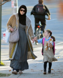 Exclusive... Boston Marathon Bombing Suspect's Widow Katherine Russell Steps Out With Her Daughter 