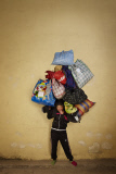 How Much Can You Carry: Photographer Floriane de Lassée shoots people carrying items on their heads - Oct 2014
