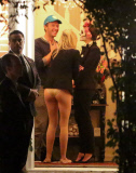 Chris Martin having fun with sexy pantless mystery blonde