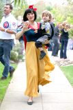 A 'Snow White' Molly Sims takes her little Batman trick-or-treating